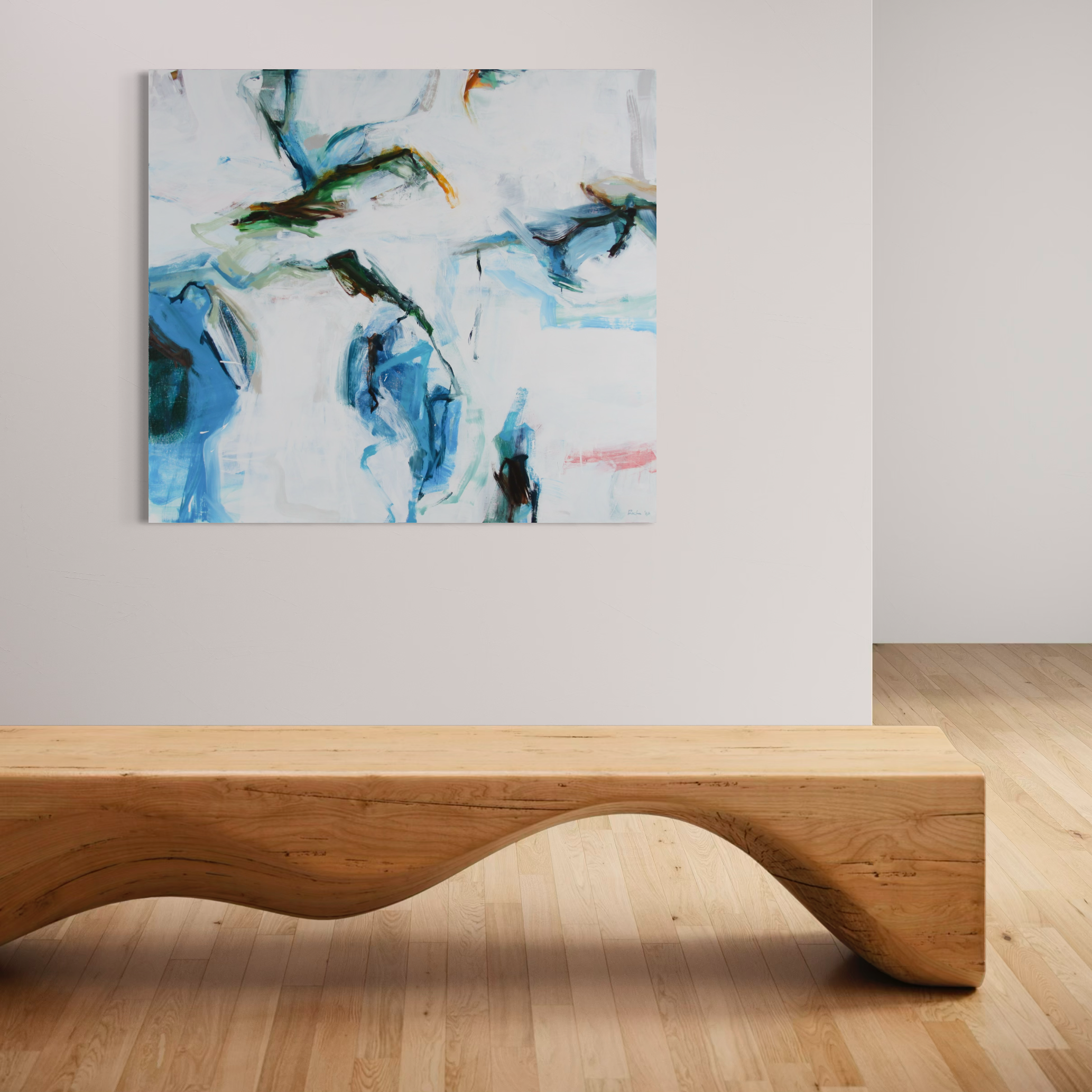 An abstract canvas painting with blue, green, black, and white brushstrokes hanging on a white wall above a modern wavy wooden bench in a minimalist room with light wood floors.