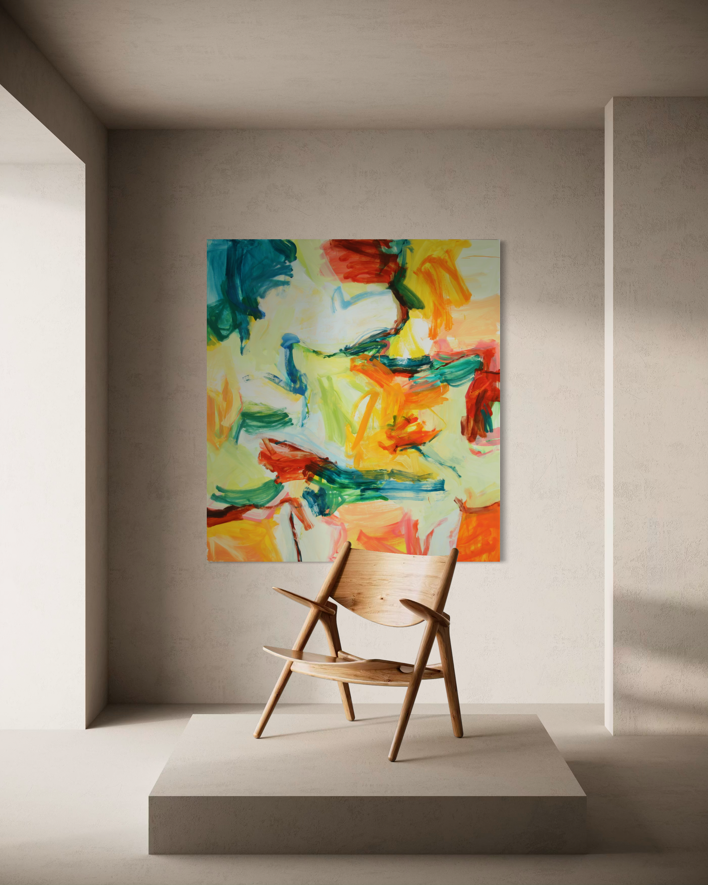 An abstract canvas painting with vibrant brushstrokes of yellow, orange, red, green, and blue, displayed on a textured gray wall above a wooden lounge chair in a minimalist room setting.