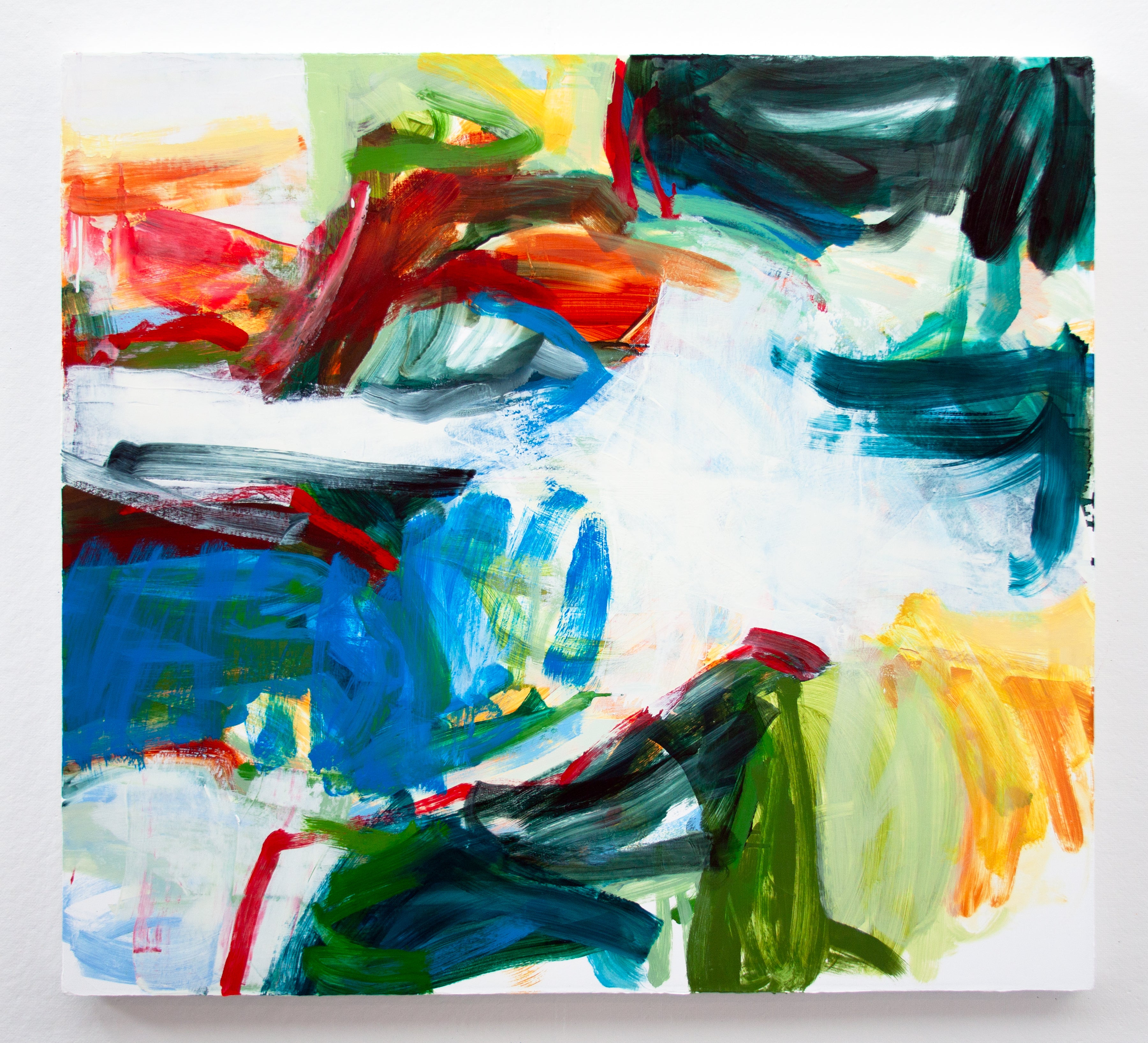 An abstract square canvas painting featuring expressive, layered brushstrokes in blue, green, red, yellow, black, and white, presented against a clean white background.