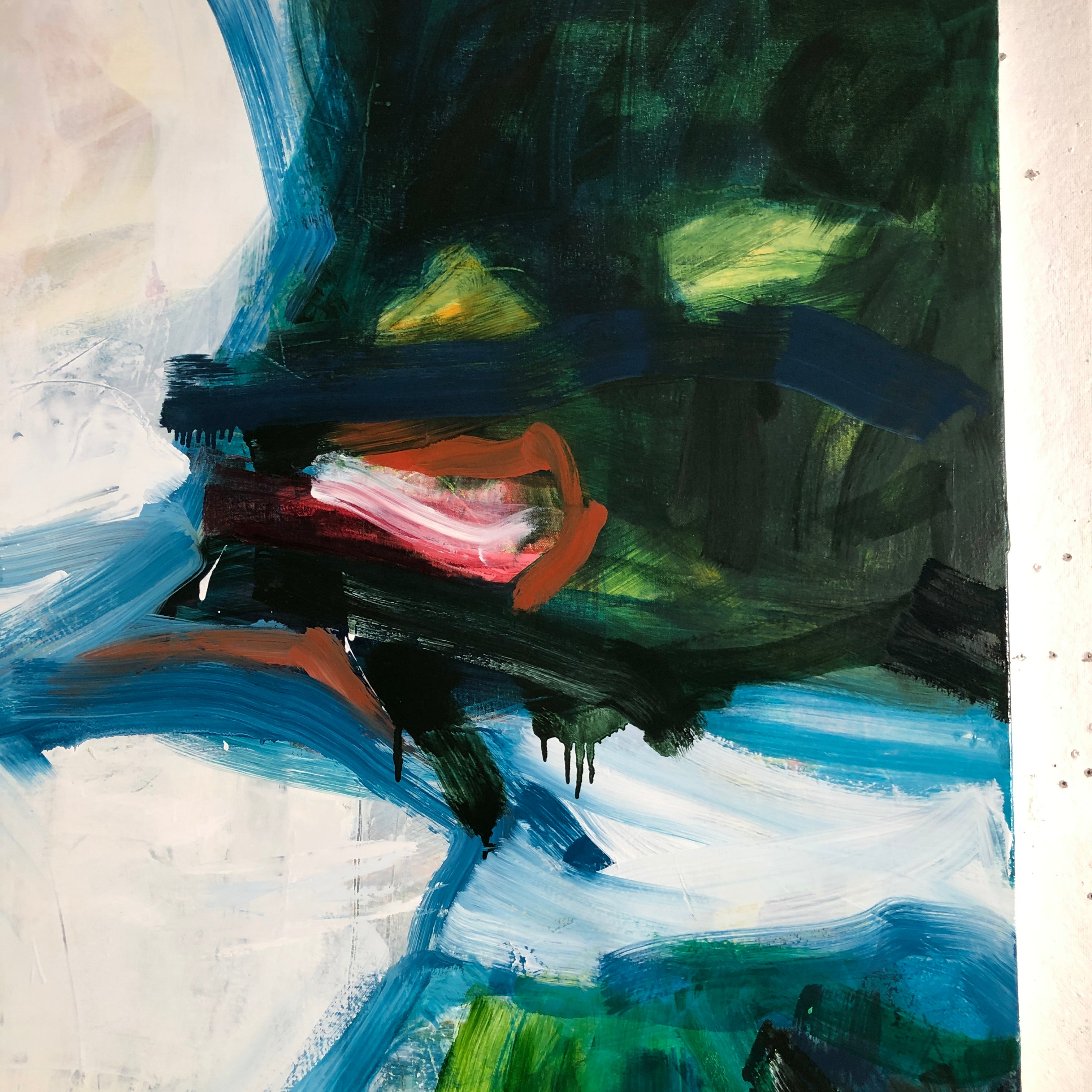 An abstract painting featuring expressive brushstrokes in deep green, blue, white, black, and a small central area of rust-orange and pink.