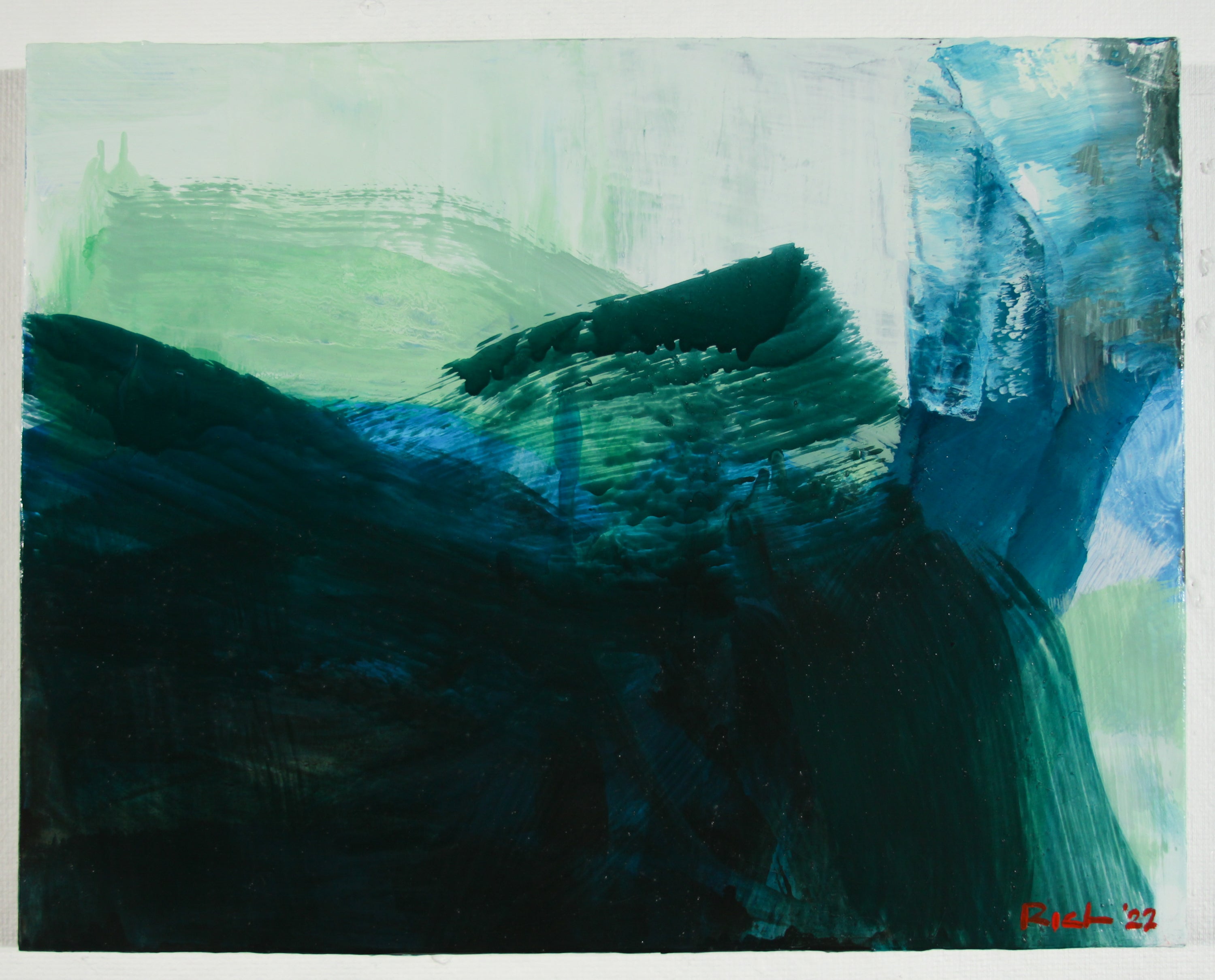 An abstract landscape painting featuring textured brushstrokes of deep teal, forest green, and light blue, with a small red artist signature in the bottom right corner.