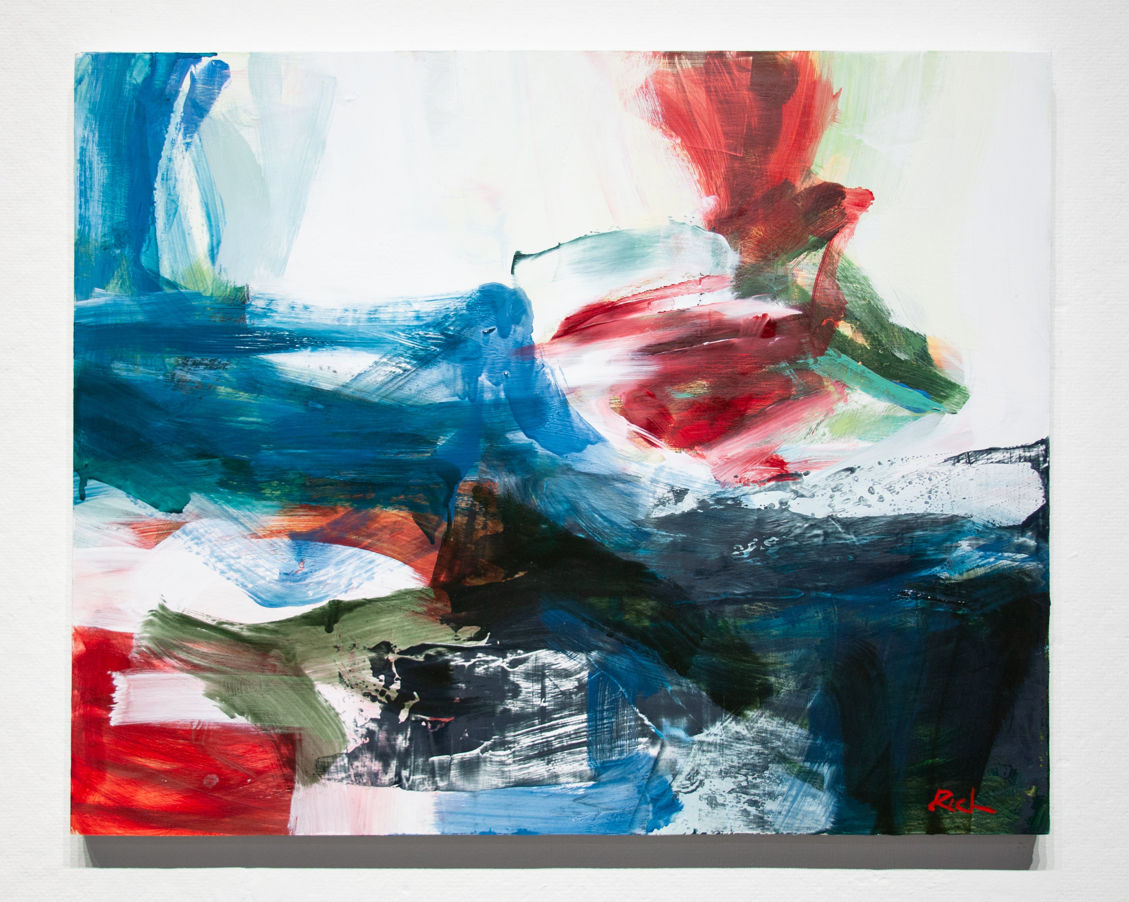 An abstract canvas painting with expressive, layered brushstrokes in blue, red, white, black, and green on a white background.